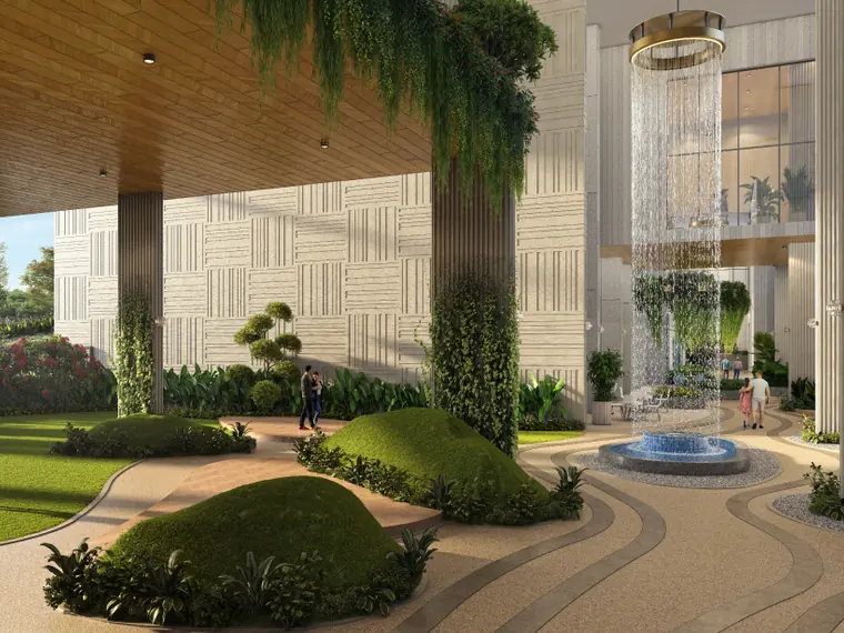 Clubhouse atrium with triple-height trickling fall at ANP Privado Baner, Pune